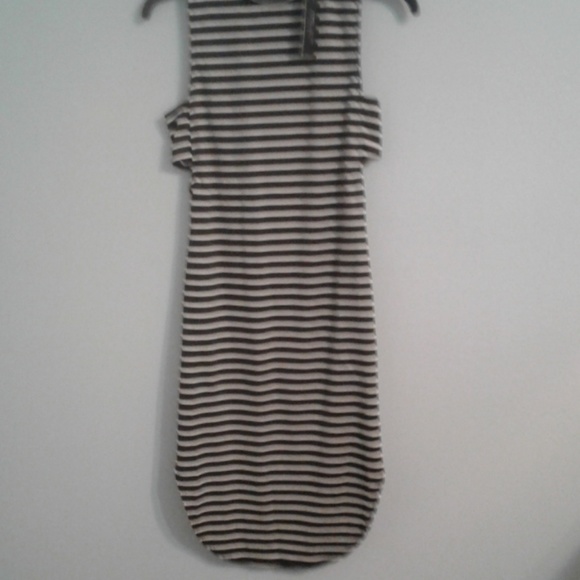 Romeo & Juliet Couture Dresses & Skirts - NWT black and white stripped dress with open sides